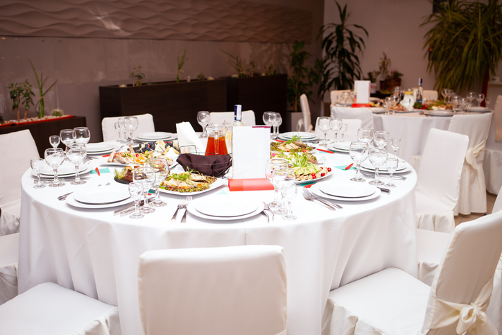 Festive served table with white tablecloth